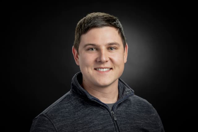 a headshot of Jake Pasternak